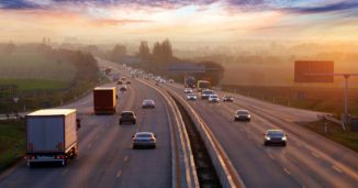 Trucks and cars on the road