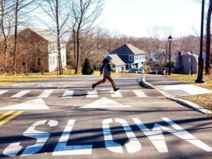 kid crossing the pedestrian