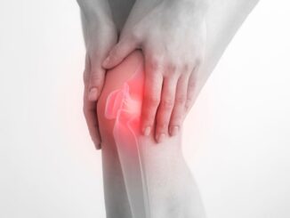 woman suffering from wear and tear in the knee