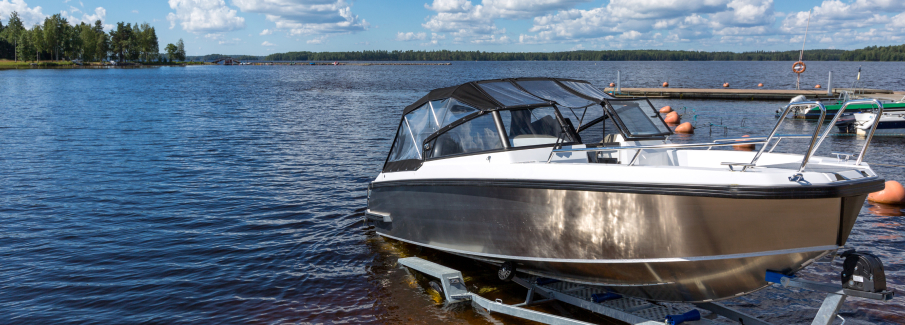 Boat at dock in lake