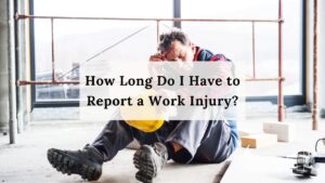 construction worker sitting on the ground after getting injured