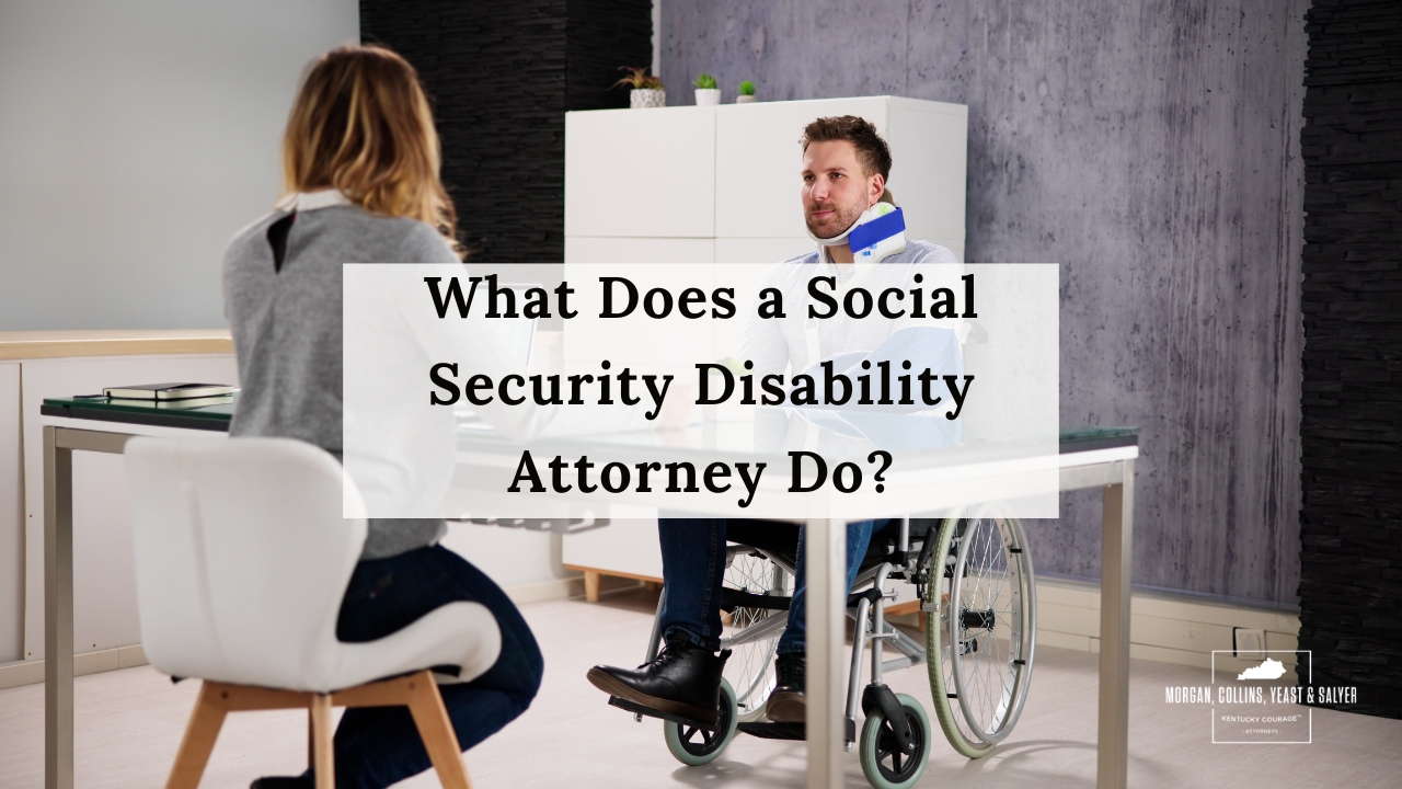 a man and woman gathered at a desk, attorney concept
