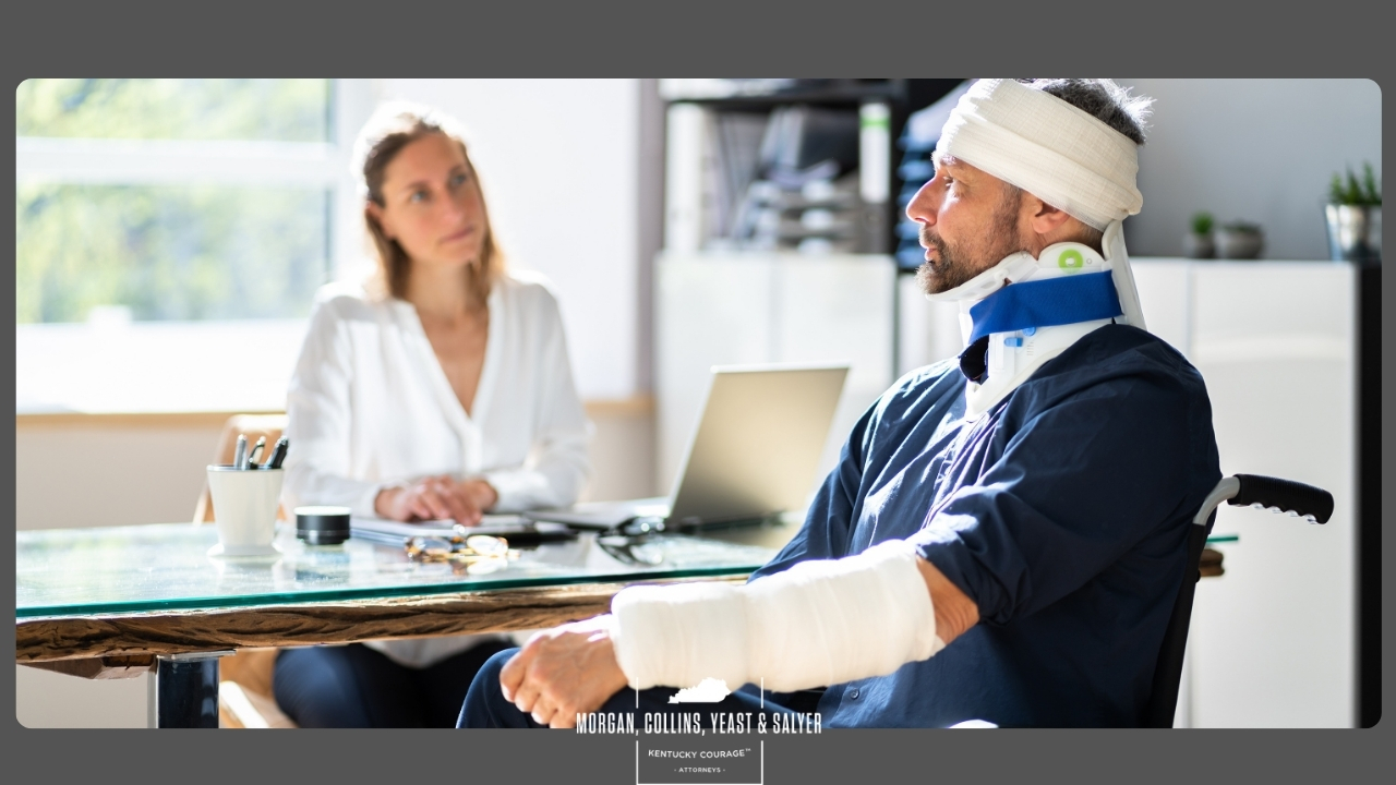 injured man consulting a personal injury lawyer