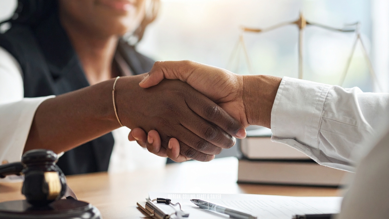 attorney shaking clients hand
