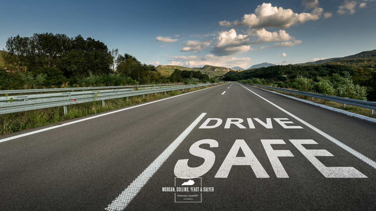 drive safe sign on a road