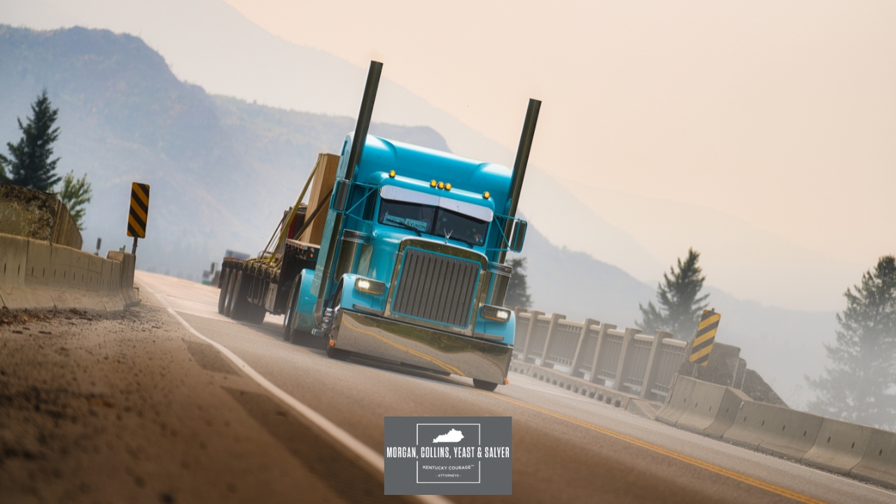 a semi-truck on a dusty road